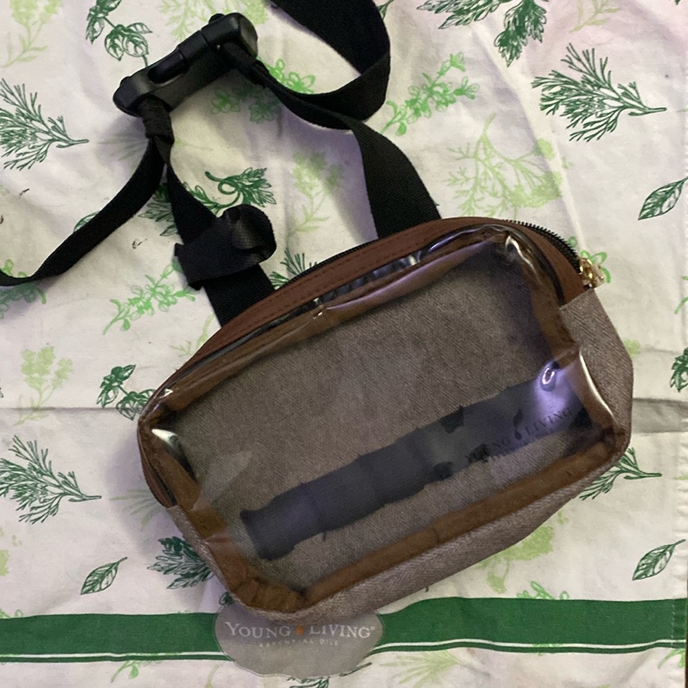 Gently used Young Living Fanny Pack clear front with slots for oils raindrop!